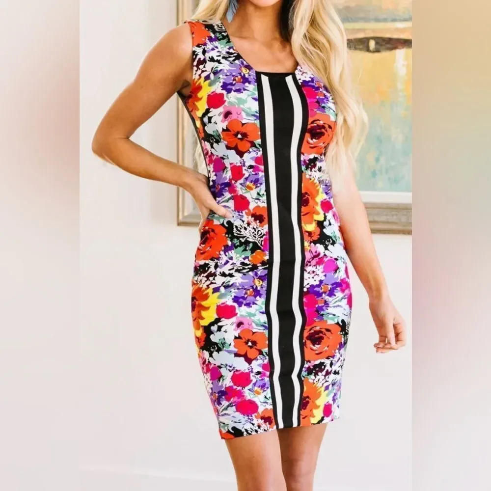 BCBGMAXAZRIA center stripe bright floral solid black back stretch midi sheath. M